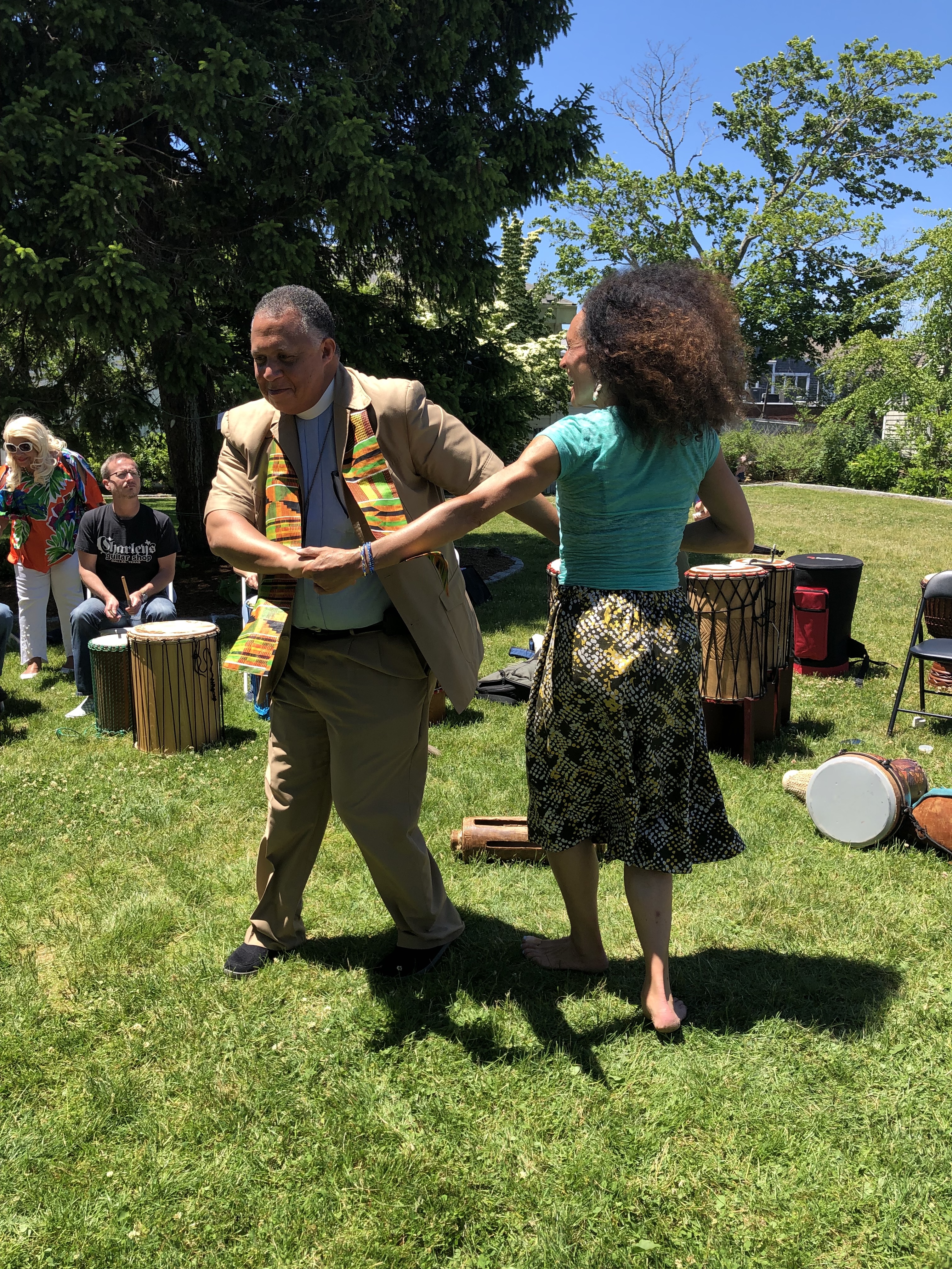 Rev. Will Mebane of St. Barnabas Episcopal Church in Falmouth with Tara Murphy of Ammaya Dance and Drum (formerly known as Cape Cod African Dance and Drum) during the 2019 Juneteenth Celebration.